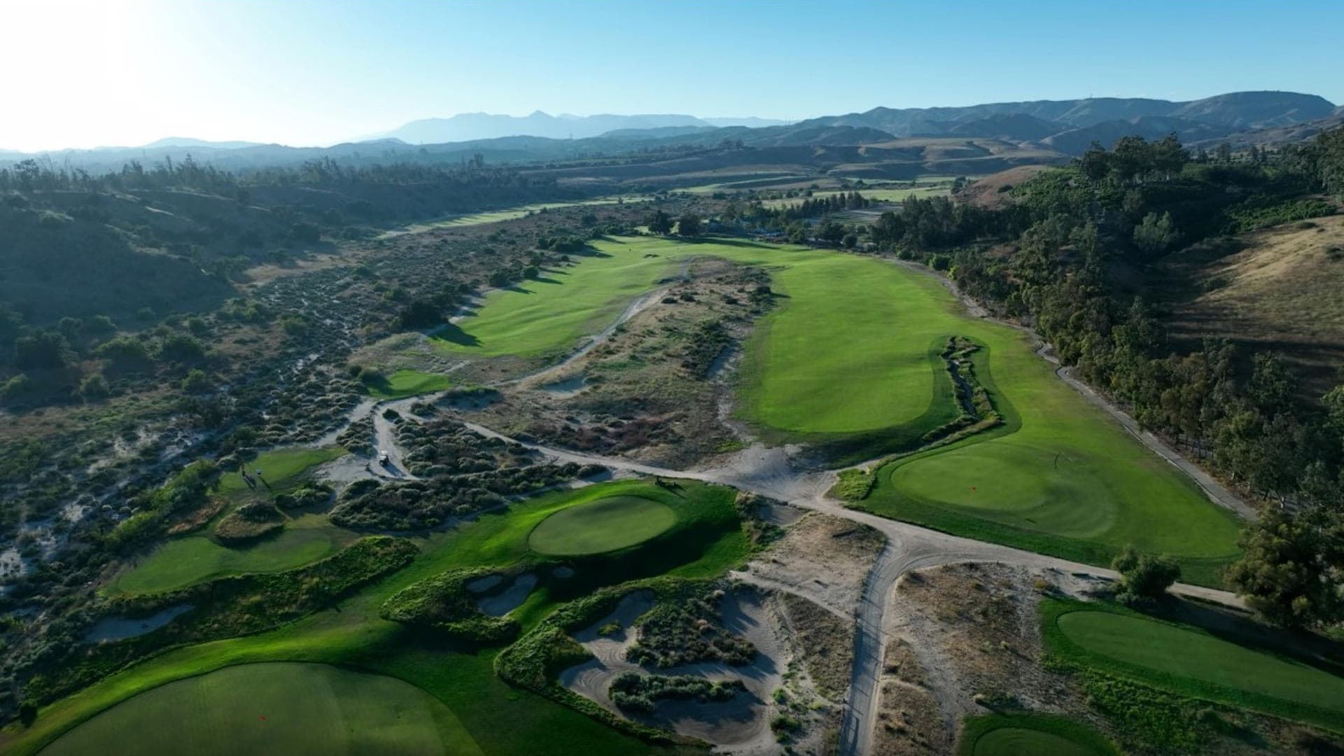 Aerial view of fairways and greens in Happy Camp Canyon.